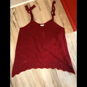 Gorgeous knit camisole with beautiful detailing.